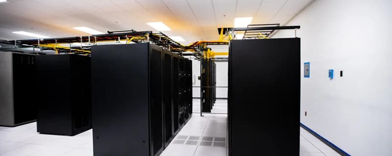 Wide view of a tym2 data hall with multiple rack rows